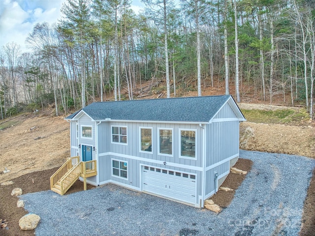 view of front of property with a garage