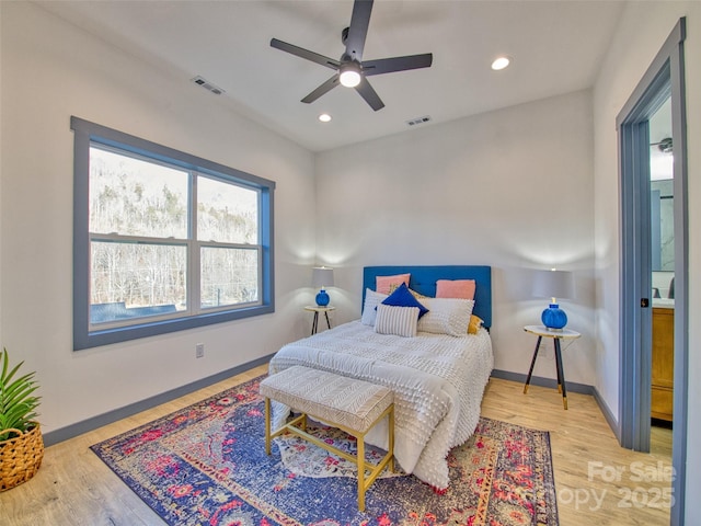 bedroom featuring ceiling fan and light hardwood / wood-style flooring