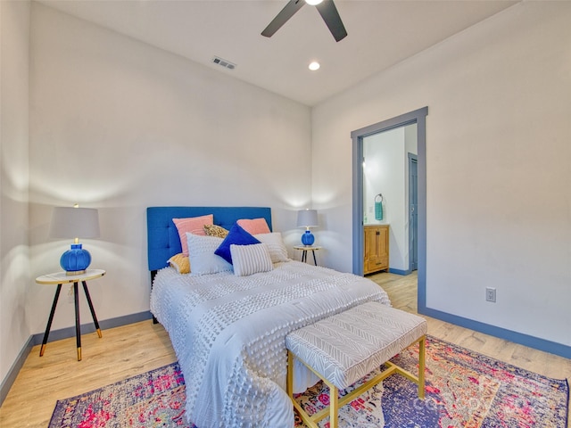 bedroom featuring ceiling fan and light hardwood / wood-style flooring