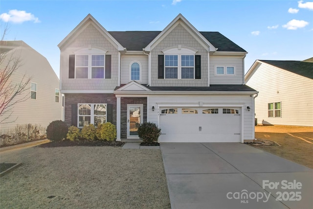 view of front of home with a garage