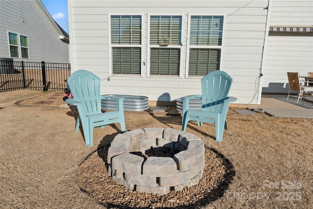 view of patio featuring an outdoor fire pit