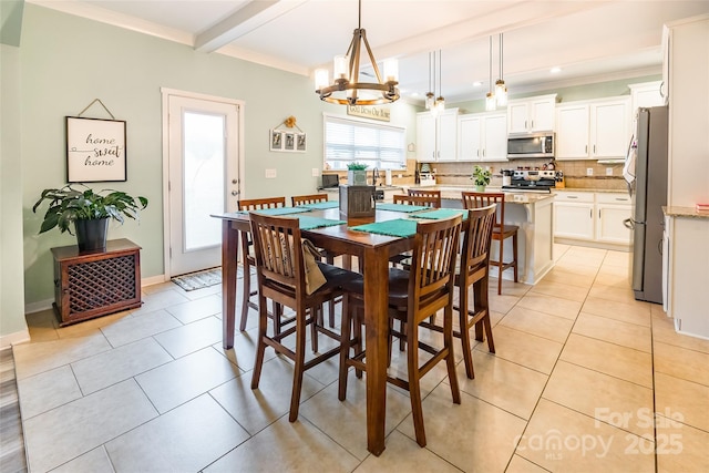 tiled dining room featuring crown molding, beam ceiling, and a chandelier