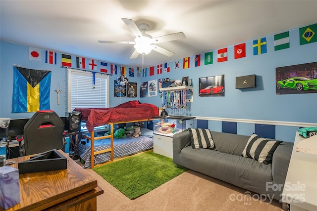 bedroom with ceiling fan and carpet floors