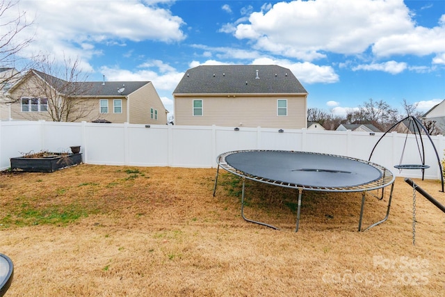 view of yard with a trampoline