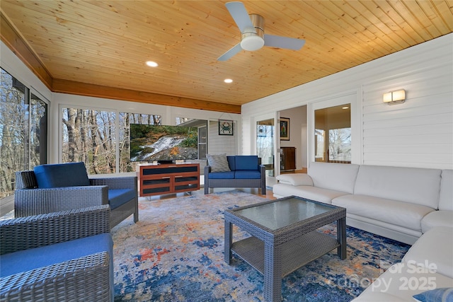 living room featuring wooden ceiling, plenty of natural light, a ceiling fan, and recessed lighting