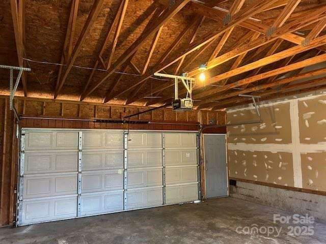 garage featuring a garage door opener