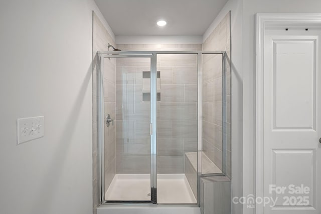 bathroom featuring walk in shower