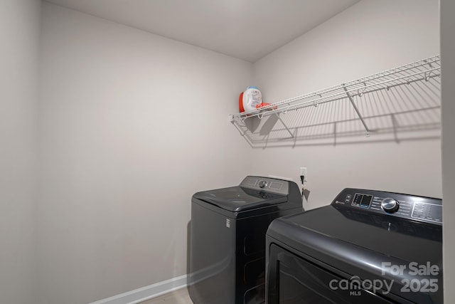 laundry room featuring independent washer and dryer