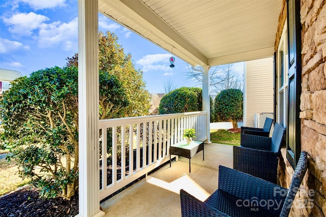 balcony featuring covered porch