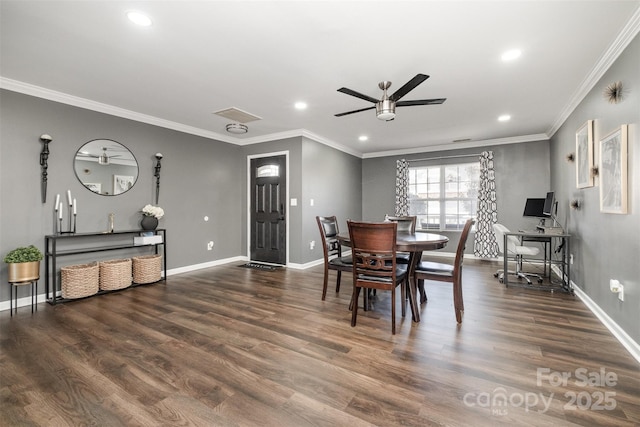 dining room featuring ornamental molding, dark hardwood / wood-style floors, and ceiling fan