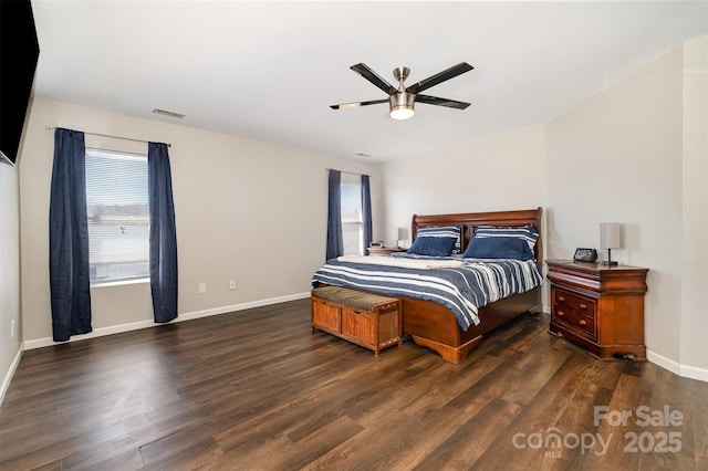 bedroom with dark wood-type flooring and ceiling fan