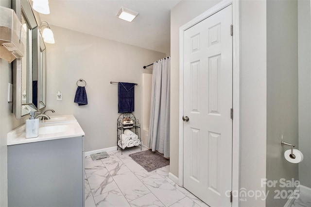 bathroom featuring vanity and a shower with curtain