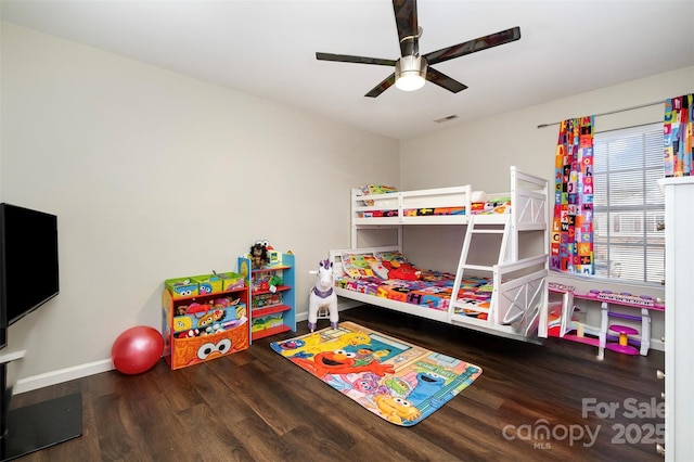 bedroom featuring hardwood / wood-style floors and ceiling fan