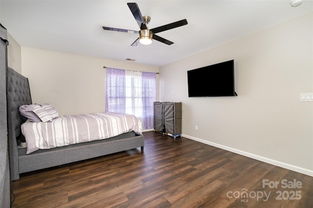 bedroom with dark wood-type flooring and ceiling fan