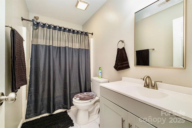 full bathroom featuring tile patterned flooring, vanity, shower / tub combo, and toilet