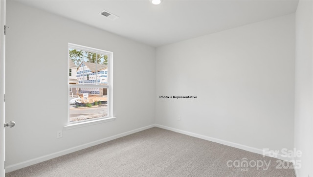 view of carpeted spare room