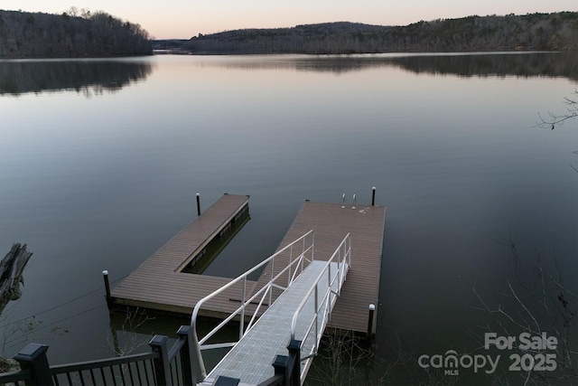 view of dock featuring a water view