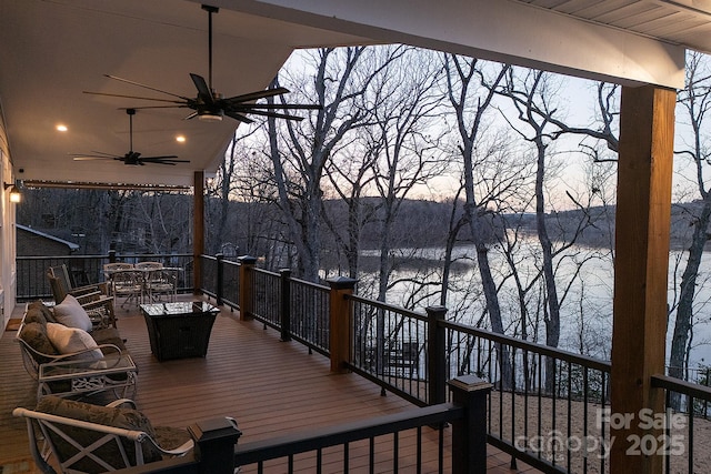 snow covered deck featuring ceiling fan