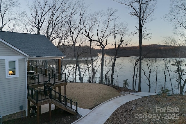 dock area with a water view