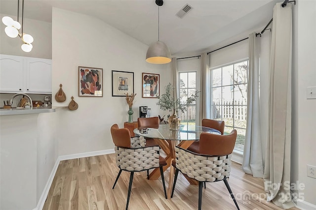 dining space featuring light hardwood / wood-style flooring