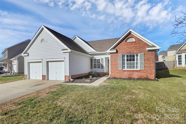 view of front of house featuring a garage and a front yard