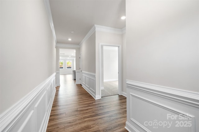 hall with crown molding and dark wood-type flooring