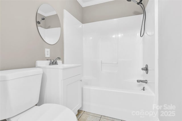 full bathroom with toilet, vanity, tile patterned flooring, ornamental molding, and bathing tub / shower combination