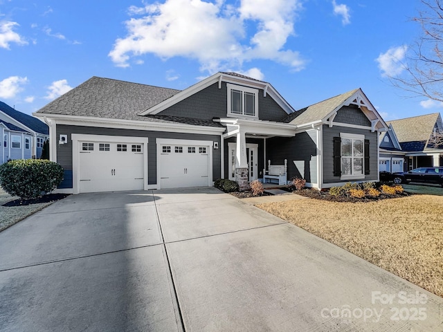 craftsman house featuring a garage and a porch