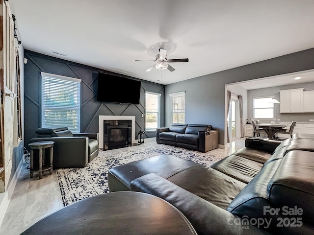 living room with ceiling fan