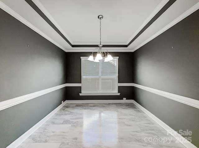 unfurnished dining area featuring a raised ceiling, a notable chandelier, and crown molding