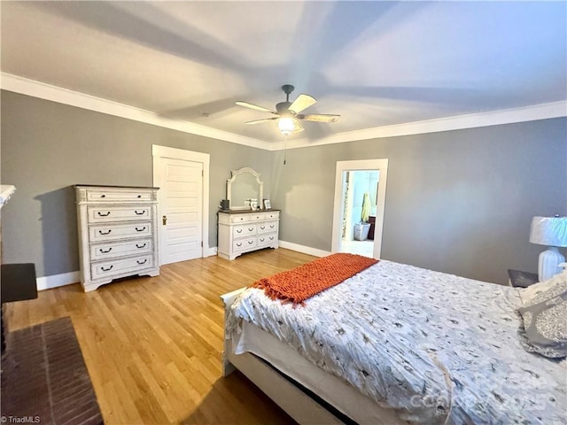 bedroom with ceiling fan, hardwood / wood-style flooring, and ornamental molding