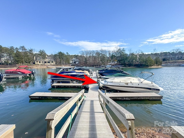 view of dock with a water view