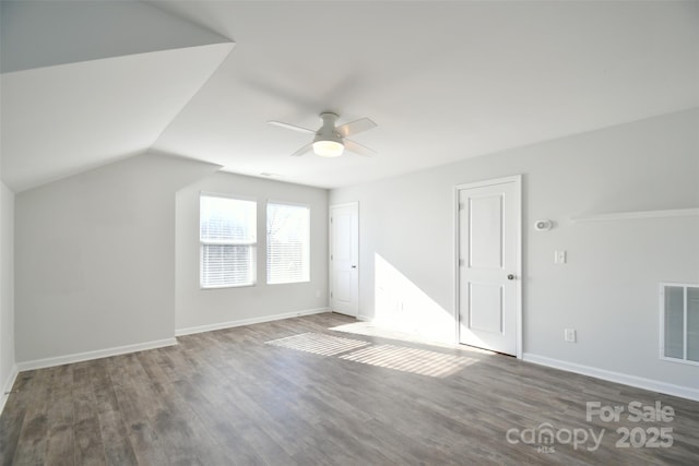 bonus room with wood-type flooring, ceiling fan, and vaulted ceiling