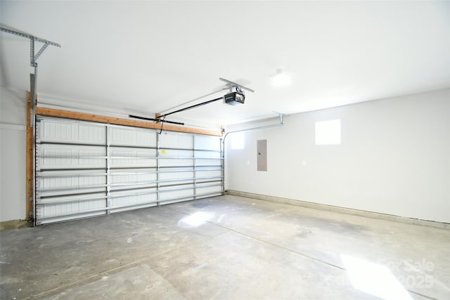 garage featuring a garage door opener and electric panel