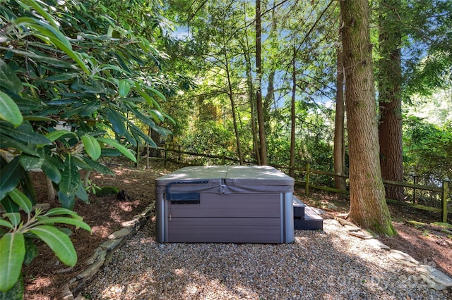 view of yard with a hot tub