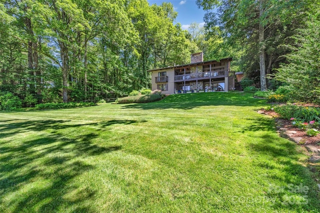 view of yard with a deck