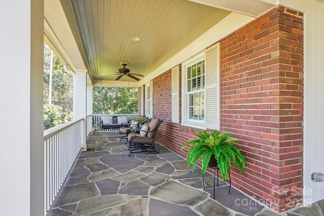 view of patio / terrace featuring ceiling fan and a porch