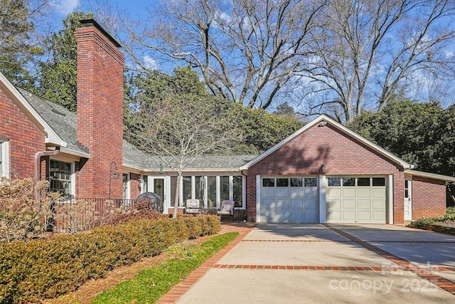 view of front of property with a garage