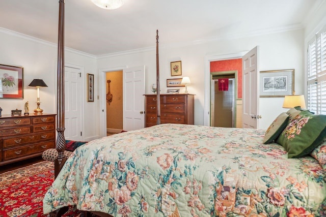 bedroom with a closet and ornamental molding