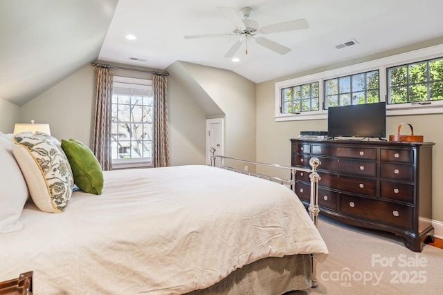 bedroom with ceiling fan and vaulted ceiling