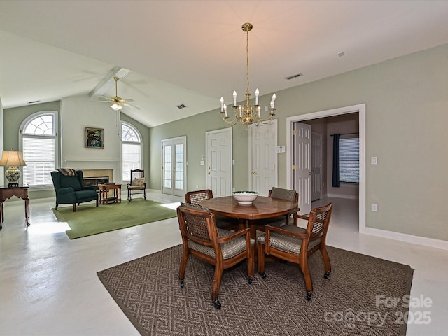 dining room with concrete floors, ceiling fan with notable chandelier, and lofted ceiling with beams