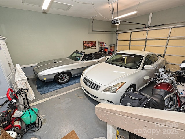 garage featuring a garage door opener