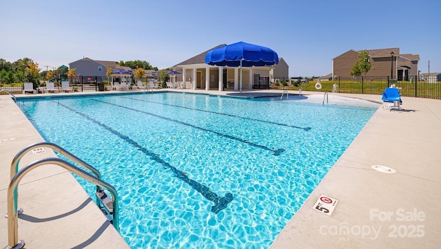 view of pool featuring a patio