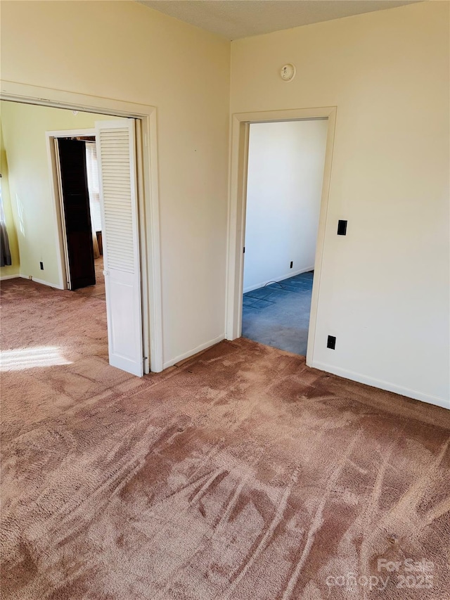 spare room featuring carpet flooring