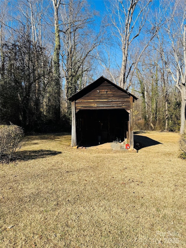 garage with a lawn