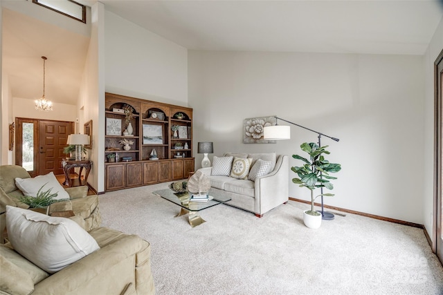 living room featuring high vaulted ceiling, carpet, and a chandelier