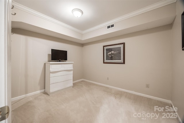 unfurnished bedroom with light colored carpet and crown molding