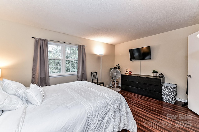 bedroom featuring a textured ceiling