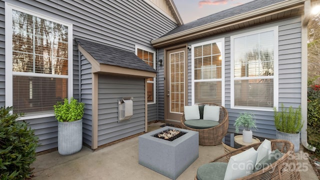 view of patio / terrace featuring a fire pit