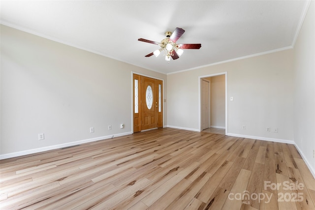 entrance foyer with crown molding, ceiling fan, and light wood-type flooring